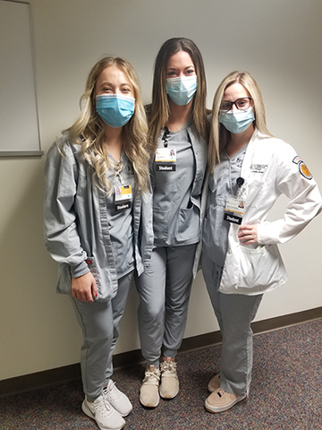recipients of the Spring 2022 Scot Heery Scholarship Award Photo of three radiologic tech student award recipients wearing gray scrubs and masks